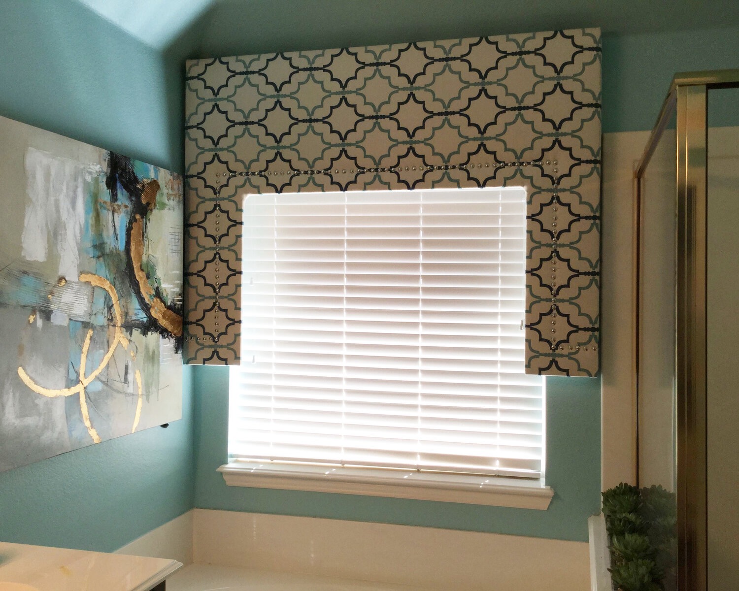 Decorative blind treatment in bathroom